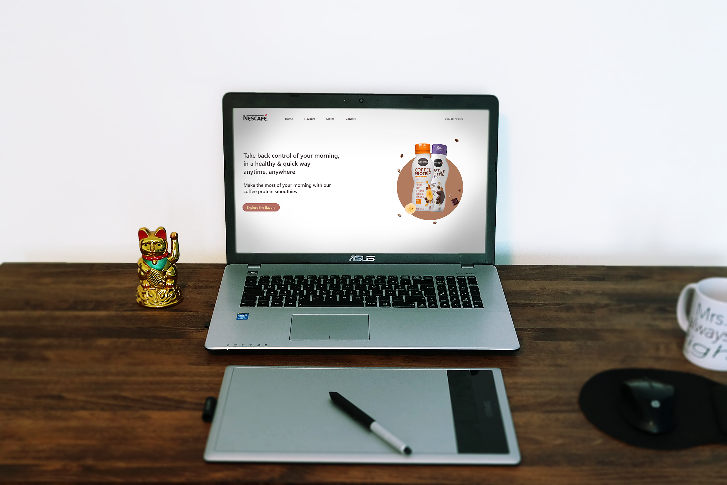 Laptop mockup displaying the home page of the Nescafé Protein Shake website